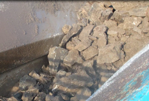 blasted-grey-granite-feed-material Blasted grey granite to be fed into a jaw crusher